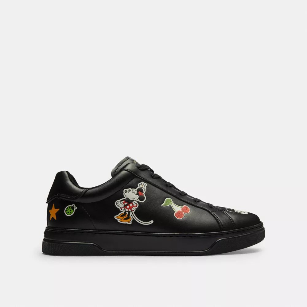 Baskets montantes Disney x Coach avec imprimé autocollant