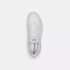 Baskets Strider en Signature Canvas