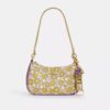 Bijou de sac à fermeture à pression avec imprimé floral
