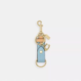 Bijou de sac « Trigger Snap » en cuir emblématique avec pendentif
