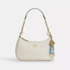 Bijou de sac « Trigger Snap » en cuir emblématique avec pendentif