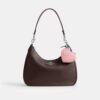 Bijoux de sac en forme de cœur en cuir Signature avec breloque en forme de cœur