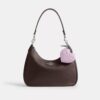 Bijoux de sac en forme de cœur en cuir Signature avec breloque en forme de cœur