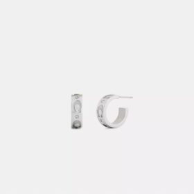 Boucles d’oreilles « Huggie » avec motif « C » répété