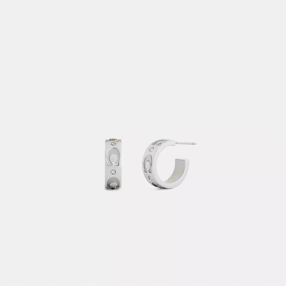 Boucles d’oreilles « Huggie » avec motif « C » répété