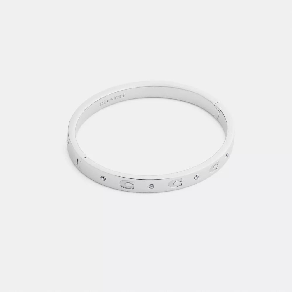 Bracelet à charnières avec motif « C » répété