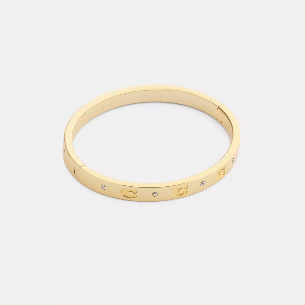 Bracelet à charnières avec motif « C » répété