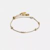 Bracelet coulissant avec perles en forme de C sculptées