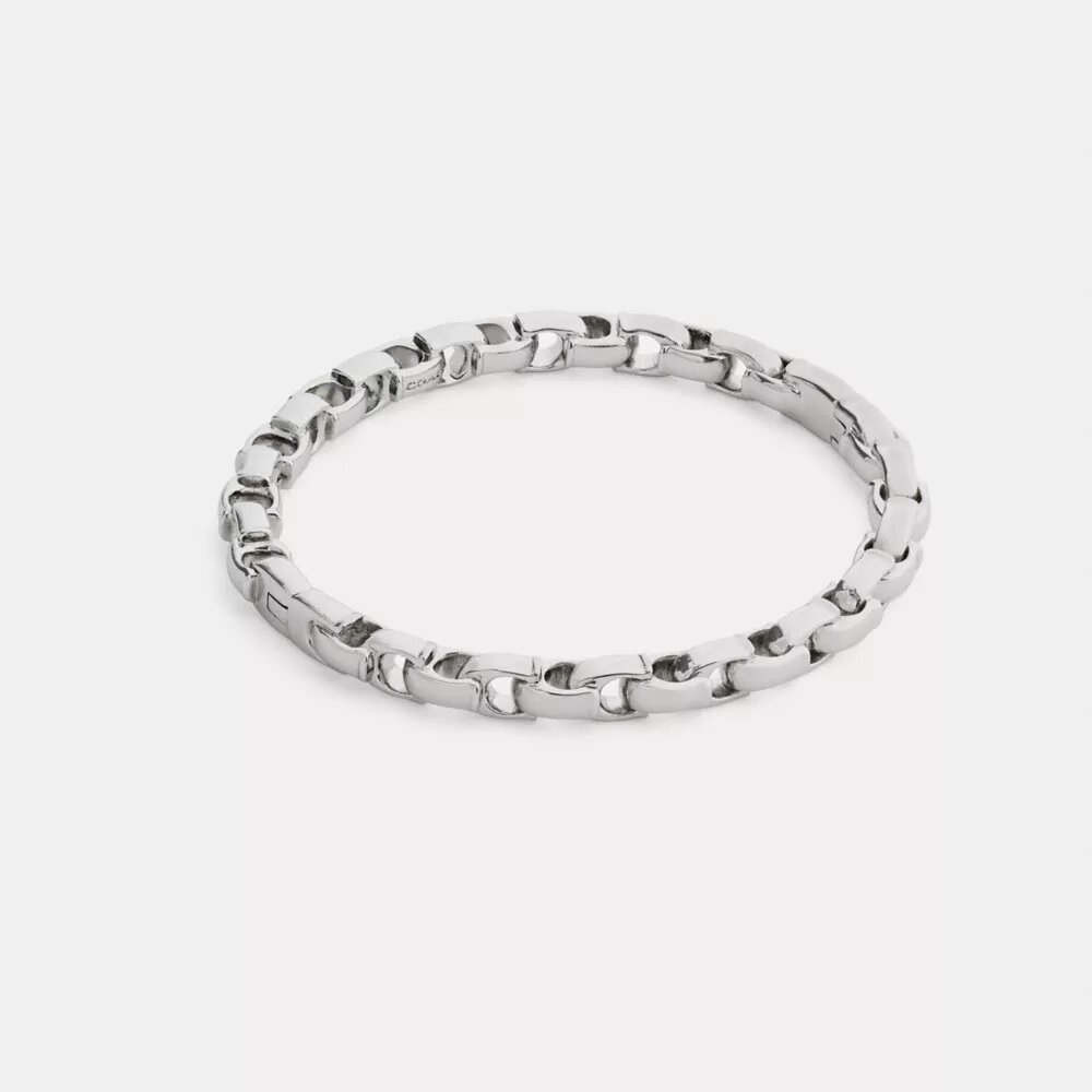 Bracelet rigide à charnière avec chaîne emblématique