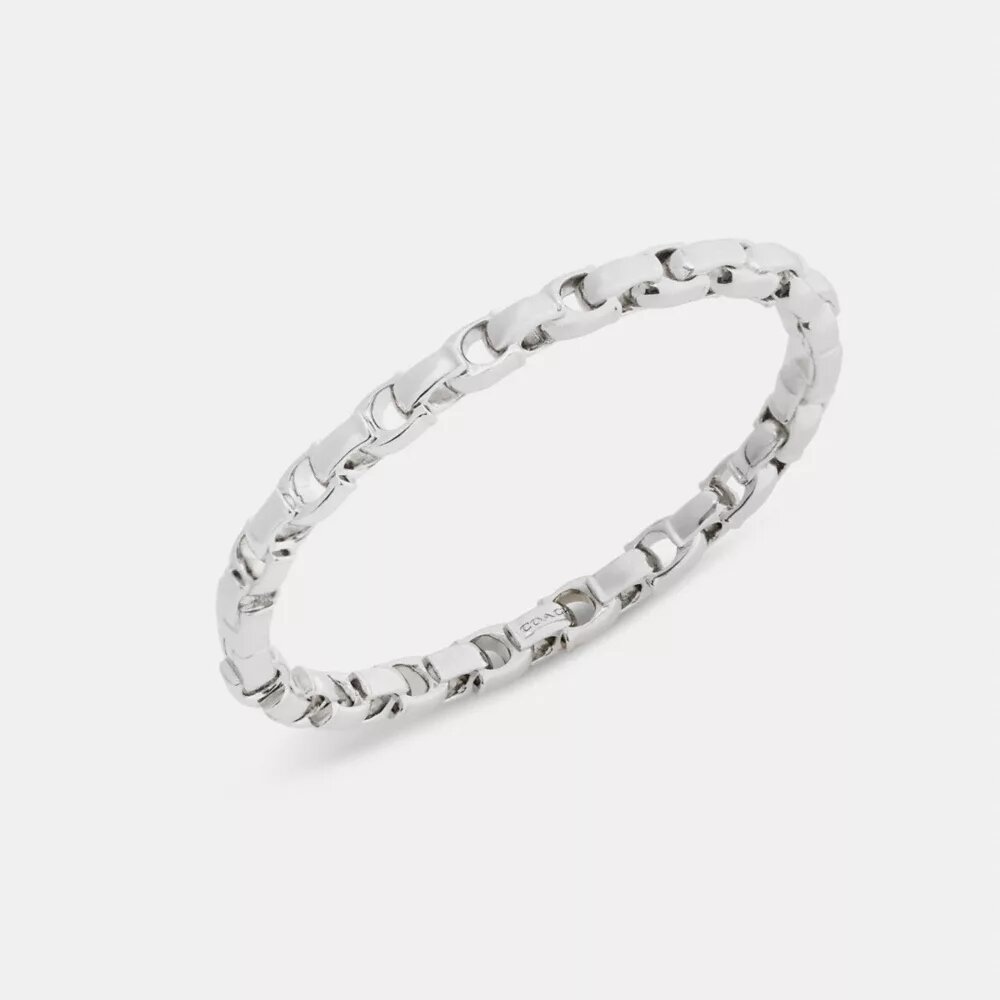 Bracelet rigide à charnière avec chaîne emblématique
