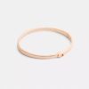 Bracelet rigide fin à charnière, signature de la marque