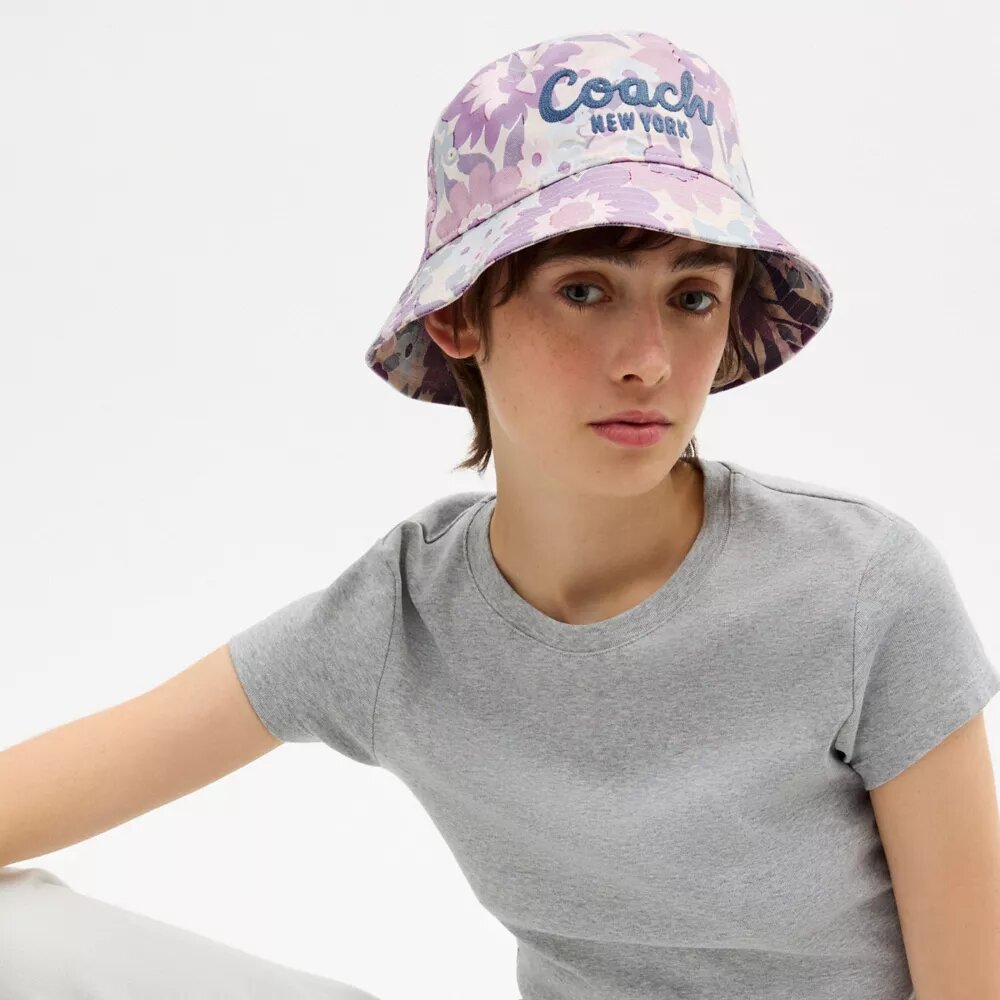 Chapeau bob à imprimé floral « Coach Script »