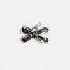 Charm pour lacets en forme de nœud