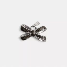 Charm pour lacets en forme de nœud