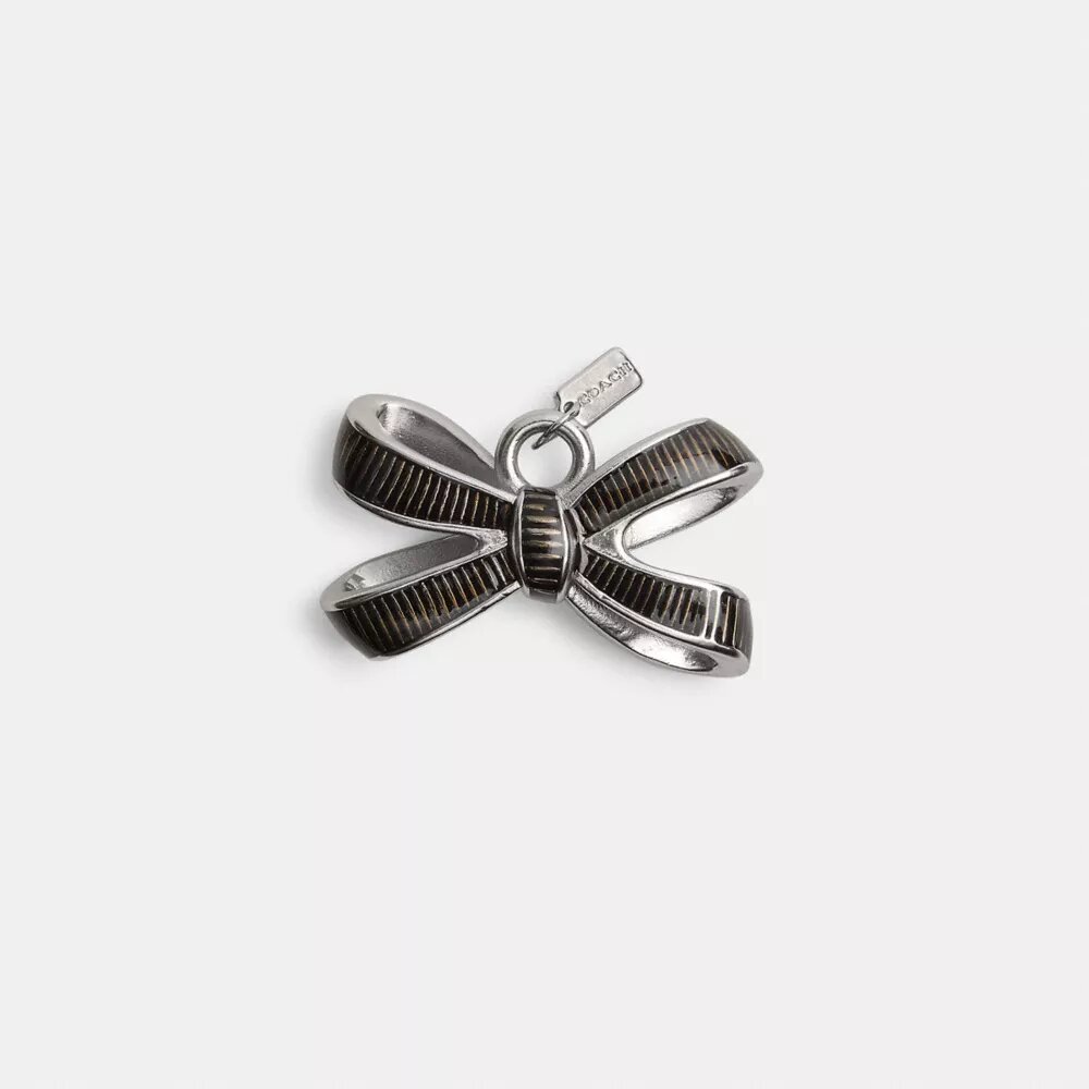 Charm pour lacets en forme de nœud