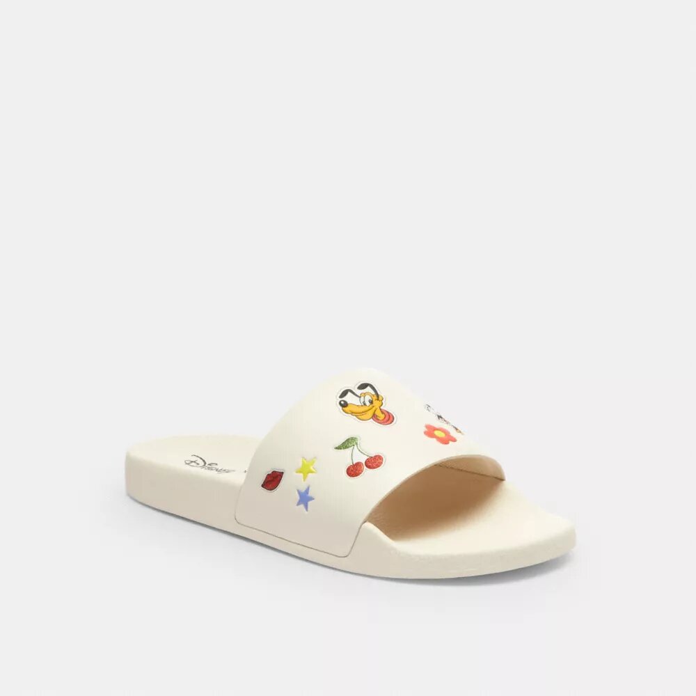 Claquettes de sport Disney X Coach avec imprimé autocollant