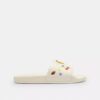 Claquettes de sport Disney X Coach avec imprimé autocollant
