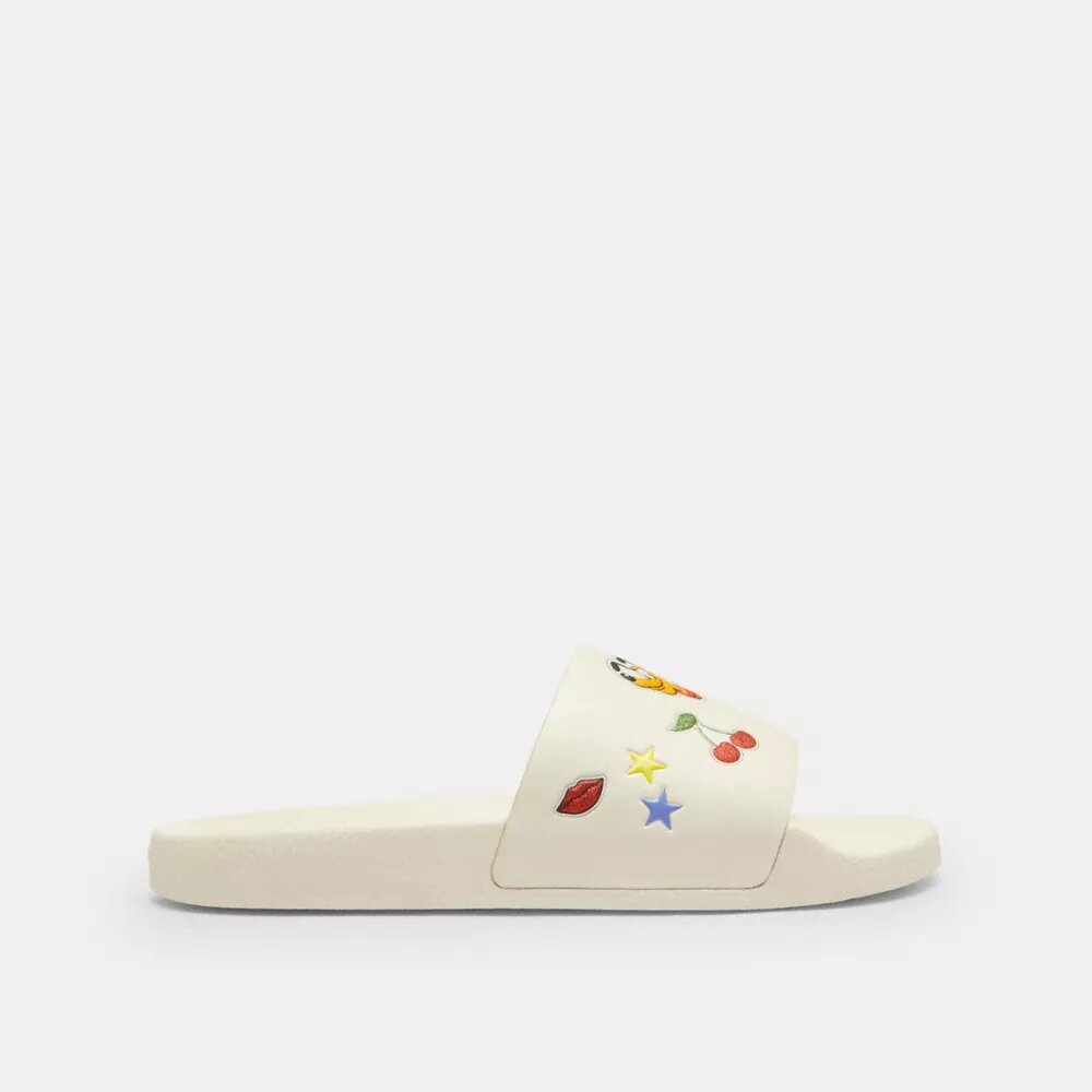 Claquettes de sport Disney X Coach avec imprimé autocollant
