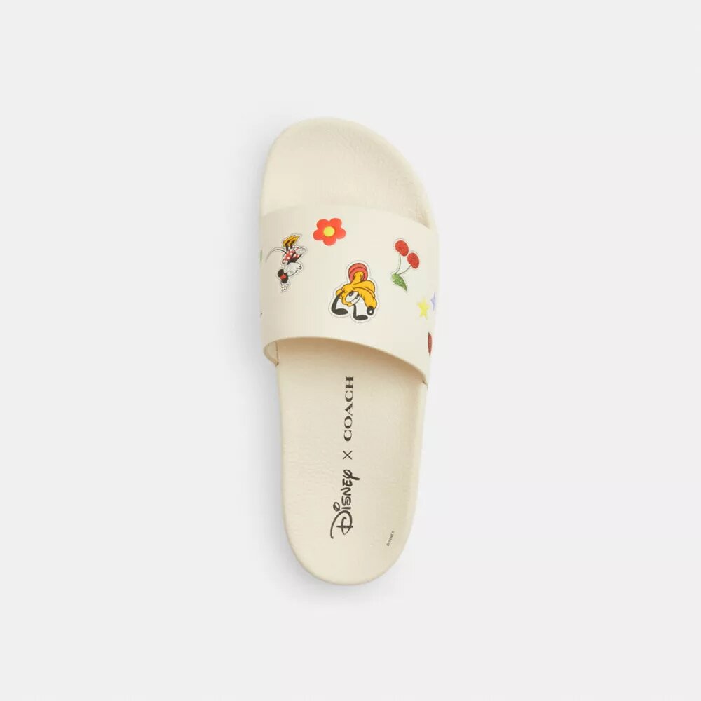 Claquettes de sport Disney X Coach avec imprimé autocollant