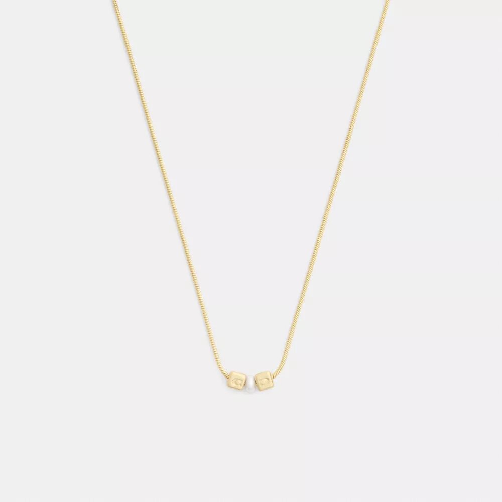 Collier avec pendentif rondelle en perle cubique