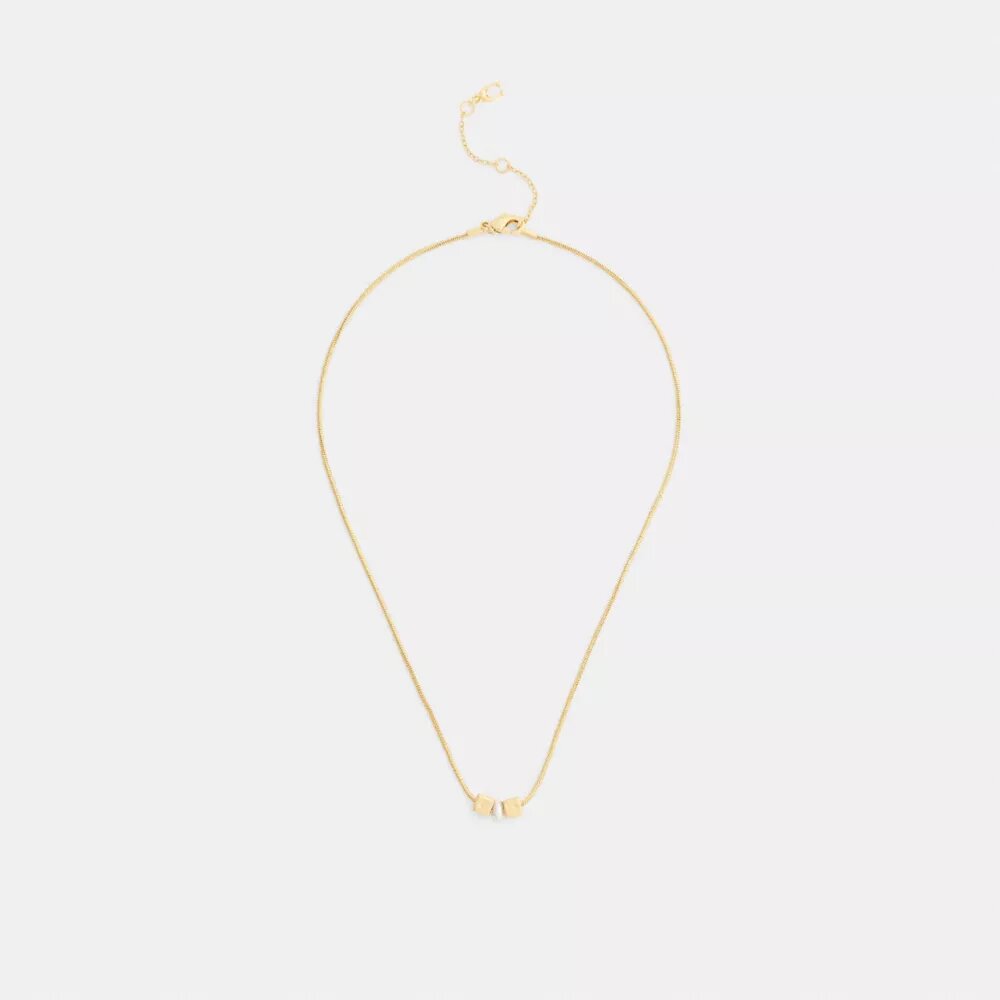 Collier avec pendentif rondelle en perle cubique