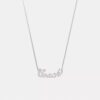 Collier avec plaque nominative « Coach Script »