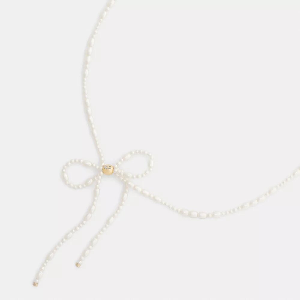 Collier ras-du-cou à nœud en perles