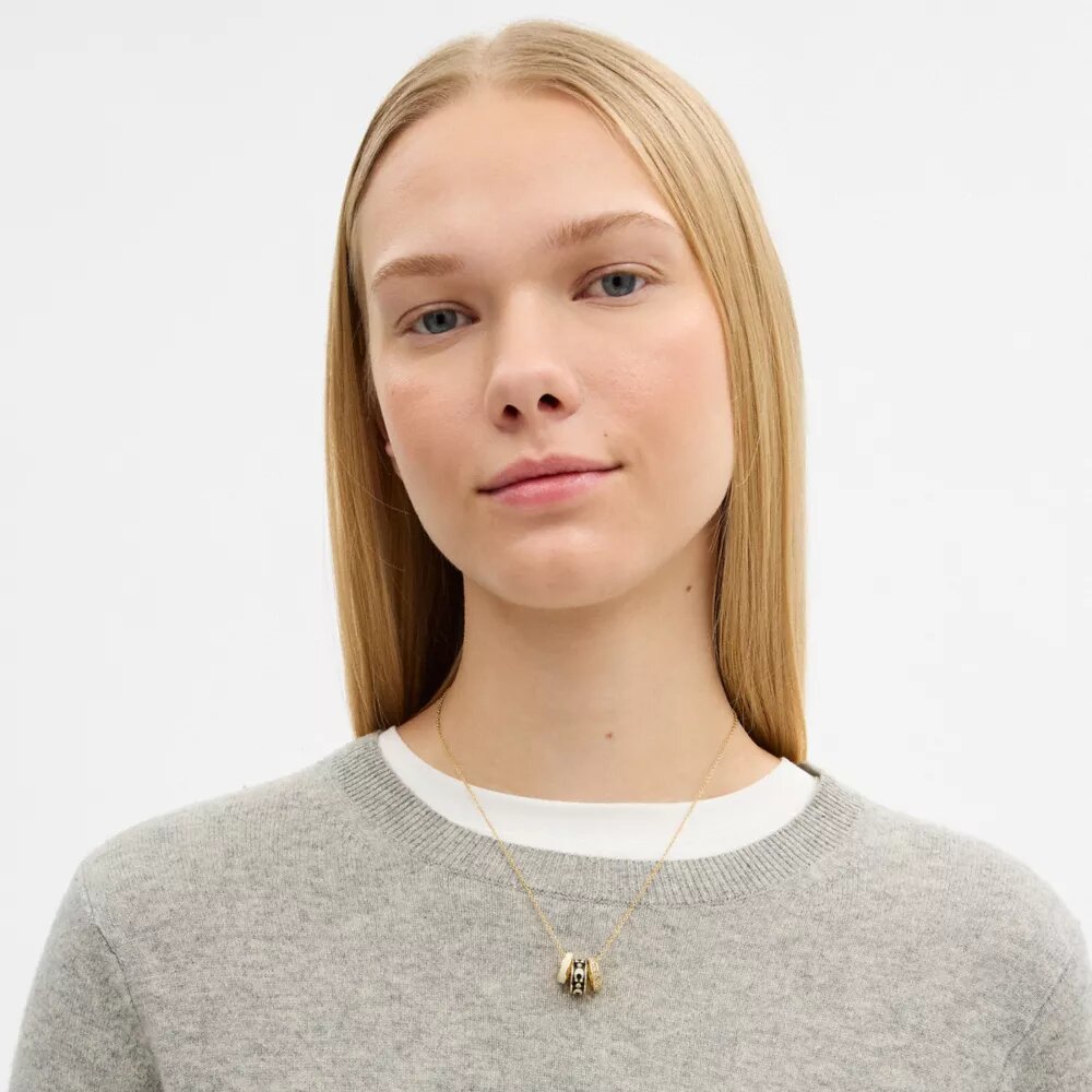 Collier à rondelles en C répétées