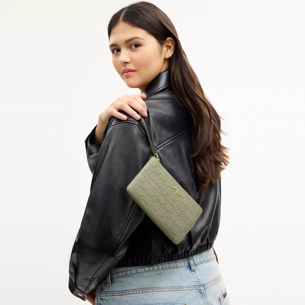 Grand sac à main d'angle à fermeture éclair en cuir emblématique