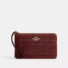 Grande pochette dragonne à fermeture éclair d'angle