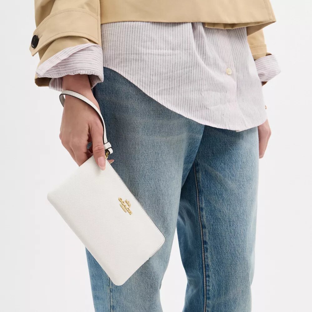 Grande pochette dragonne à fermeture éclair d'angle