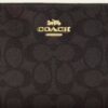 Grande pochette dragonne à fermeture éclair d'angle en Signature Canvas