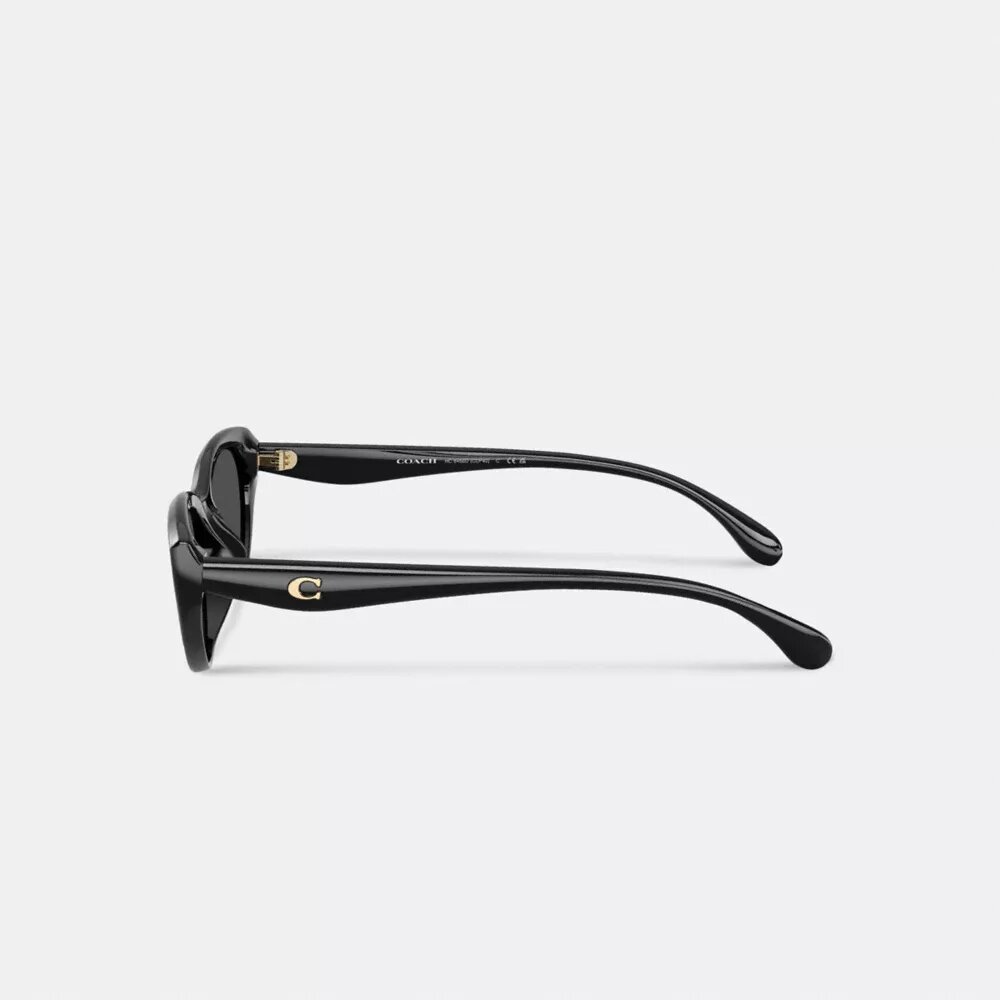Lunettes de soleil ovales « œil de chat » avec monture dorée