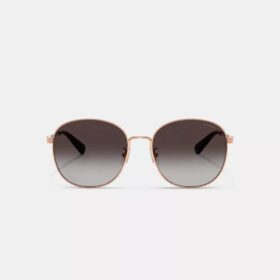 Lunettes de soleil rondes en métal avec monture C