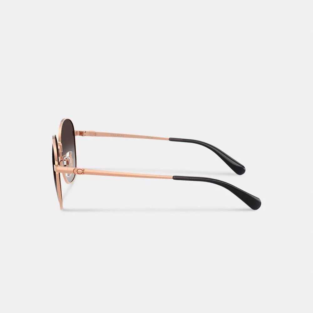 Lunettes de soleil rondes en métal avec monture C