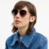 Lunettes de soleil rondes en métal avec monture C