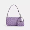 Mini bijou de sac Nolita en Signature Canvas