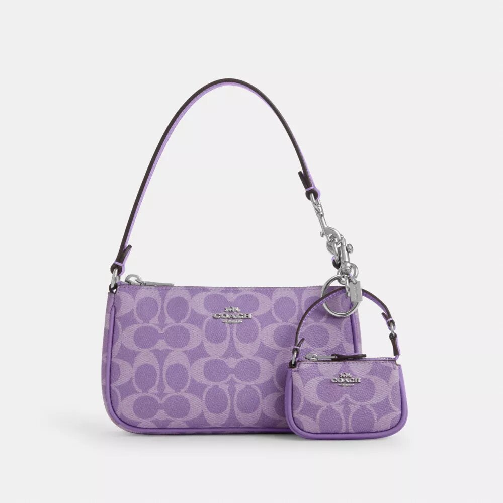 Mini bijou de sac Nolita en Signature Canvas