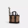 Mini bijou de sac pour sac cabas Warner en Signature Canvas