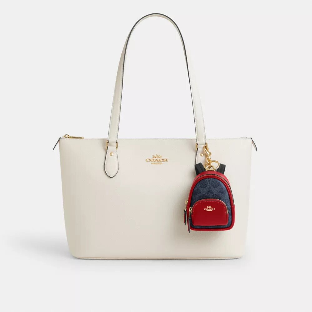 Mini Bijoux de sac pour Court Backpack en Signature Canvas