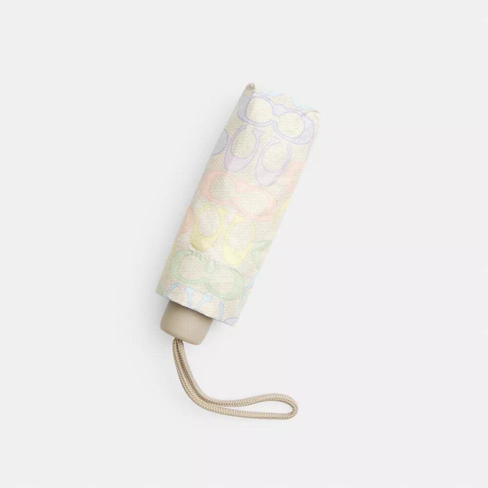 Mini-parapluie anti-UV à l’imprimé arc-en-ciel emblématique