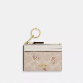 Mini-porte-carte fin en Signature Canvas à imprimé floral