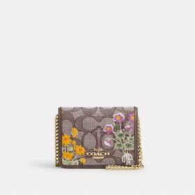 Mini-portefeuille sur chaîne en jacquard signature avec broderie florale