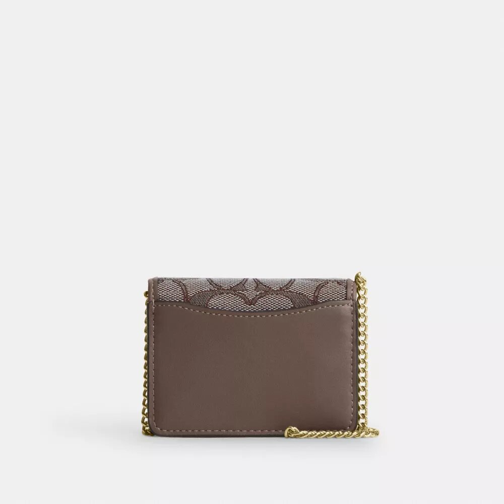 Mini-portefeuille sur chaîne en jacquard signature avec broderie florale