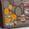 Mini-portefeuille sur chaîne en jacquard signature avec broderie florale