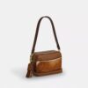 Mini sac bandoulière Carey en cuir de veau velours imprimé vache