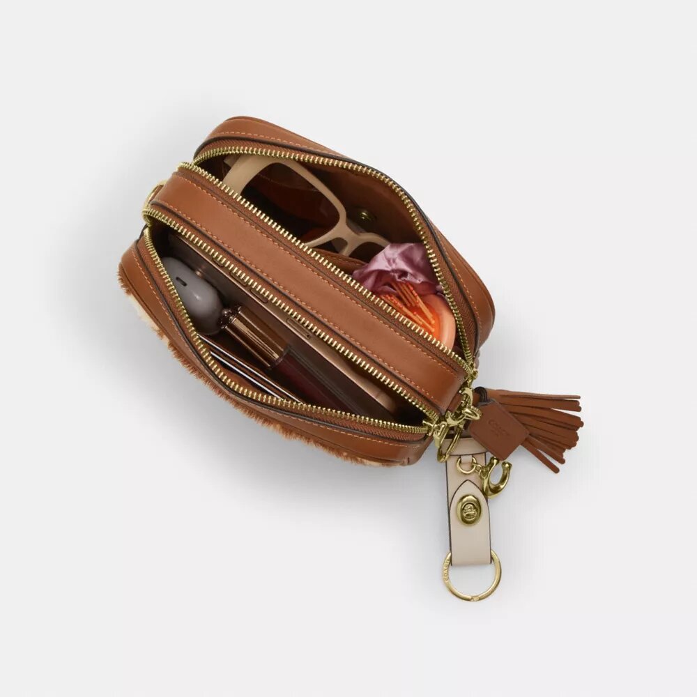 Mini sac bandoulière Carey en cuir de veau velours imprimé vache
