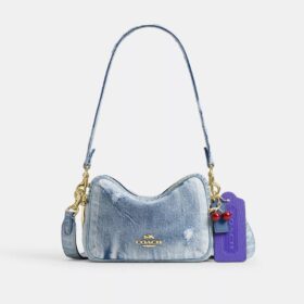 Mini sac bandoulière Carey en denim « Loved » avec Charms
