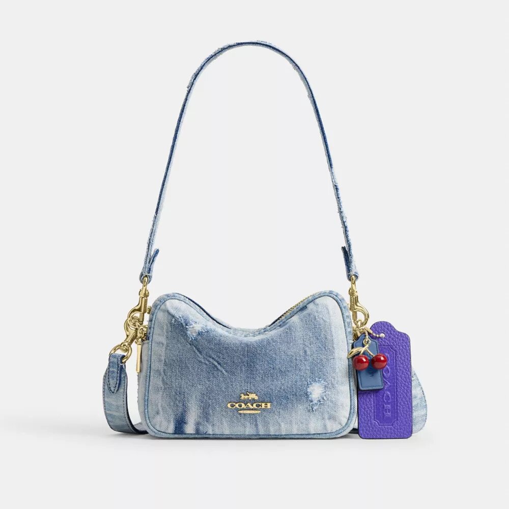 Mini sac bandoulière Carey en denim « Loved » avec Charms