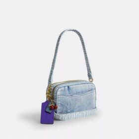 Mini sac bandoulière Carey en denim « Loved » avec Charms